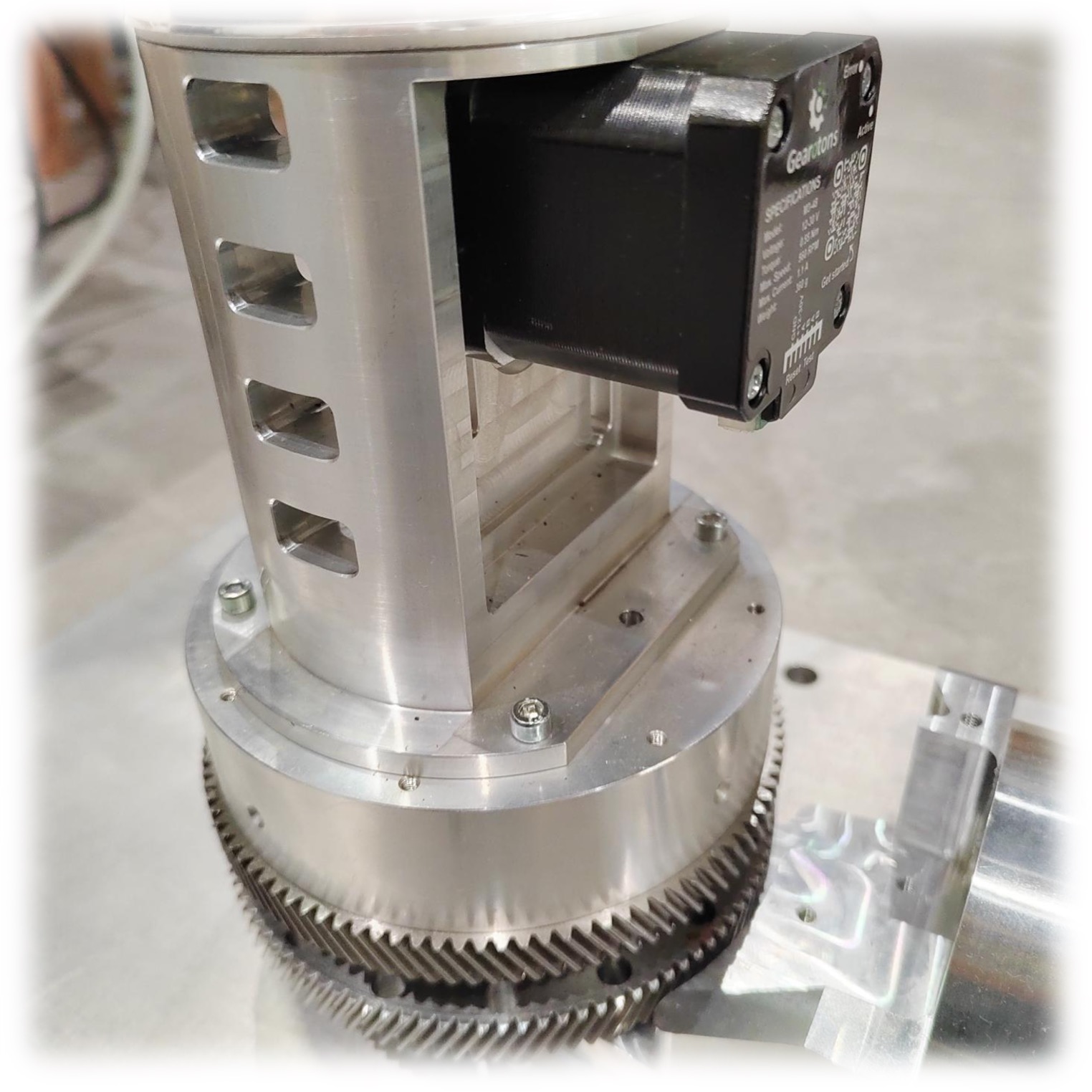 An M17 motor in a CNC and robotics metal assembly driving a large gear